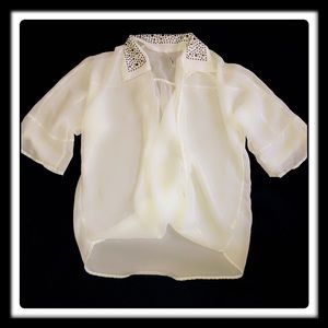 White/creamed color blouse